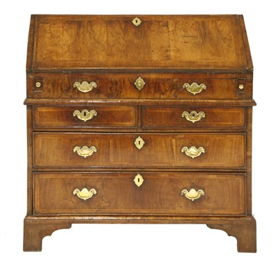 Lot 400 - A Queen Anne figured walnut bureau