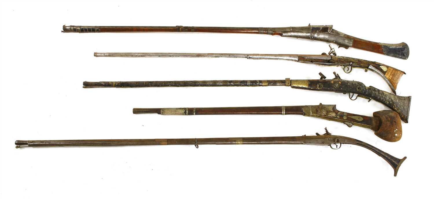 Lot 553 - Five South Indian or Sri Lankan flintlock long guns