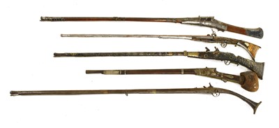 Lot 553 - Five South Indian or Sri Lankan flintlock long guns