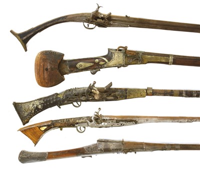 Lot 553 - Five South Indian or Sri Lankan flintlock long guns