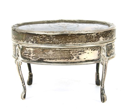 Lot 100 - An Edwardian tortoiseshell and silver jewellery box