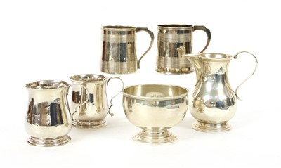 Lot 40 - A pair of hallmarked silver christening tankards