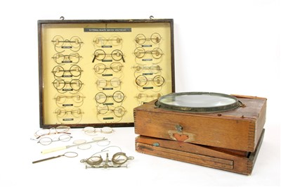 Lot 156 - A collection of mounted and loose spectacles