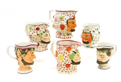Lot 192 - A group of 19th Century Staffordshire Pearlware Satyr jugs