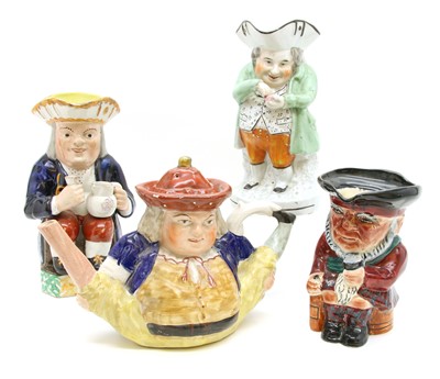 Lot 146 - A 19th Century Staffordshire Snuff Taker Toby jug