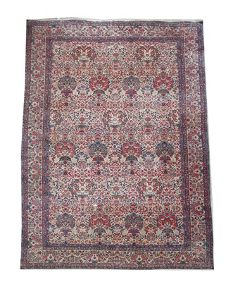 Lot 36 - A Kirman carpet