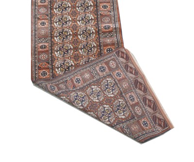 Lot 29 - A Tekke design Afghan runner
