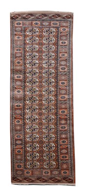 Lot 29 - A Tekke design Afghan runner