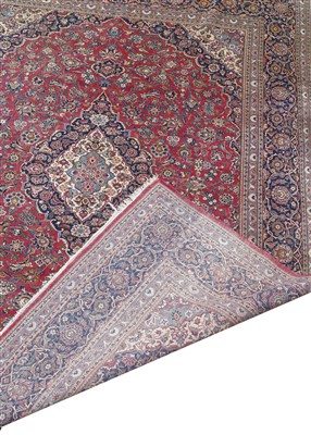 Lot 217 - A Kashan carpet