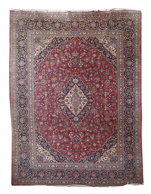 Lot 217 - A Kashan carpet