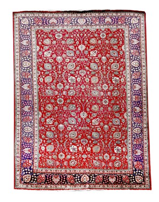 Lot 276 - A large Tabriz carpet