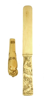 Lot 205 - A carved ivory page turner