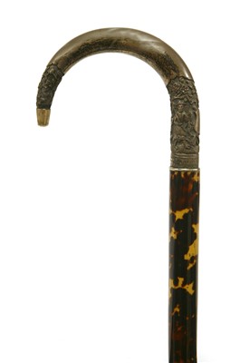 Lot 153 - A Chinese silver and tortoiseshell walking stick