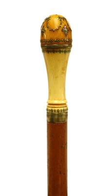 Lot 154 - An ivory and malacca gadget walking stick