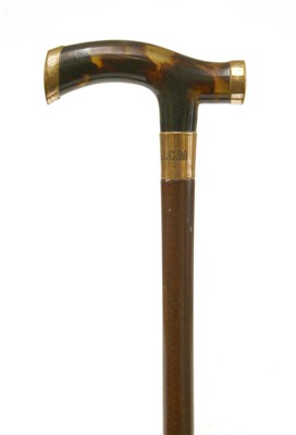 Lot 157 - A tortoiseshell and snakewood walking stick