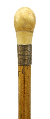 Lot 163 - An ivory and malacca gadget cane