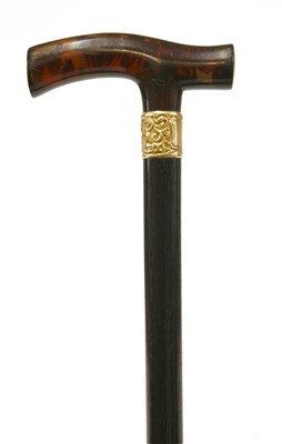 Lot 159 - A tortoiseshell and ebonised walking stick