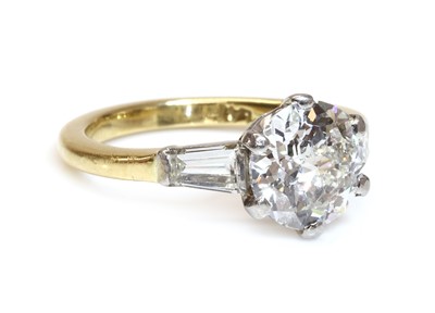 Lot 328 - A single stone diamond ring with a jubilee crown cut diamond