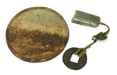 Lot 338 - A Chinese bronze mirror