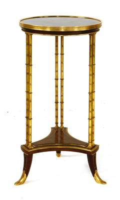 Lot 169 - A Regency-style circular occasional table
