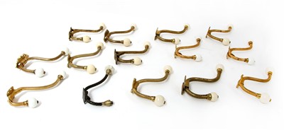 Lot 326 - Thirteen Victorian-style cast brass coat hooks