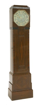 Lot 300 - An Art Deco Macassar veneered cocktail cabinet longcase clock