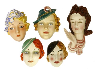 Lot 208 - Five Art Deco pottery wall masks