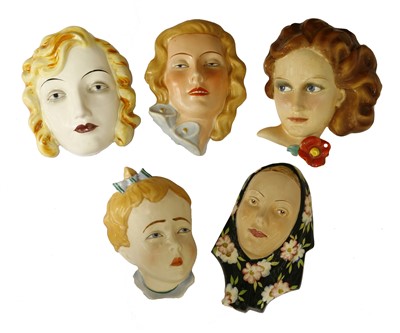 Lot 207 - Five Art Deco pottery wall masks