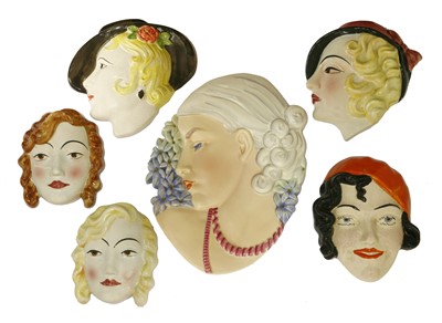 Lot 206 - Six Art Deco pottery wall masks