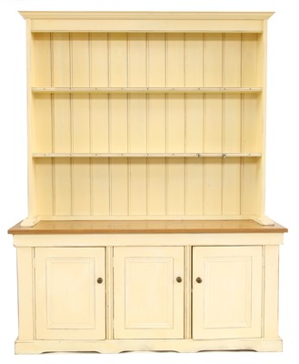 Lot 559 - A pitch pine and painted dresser