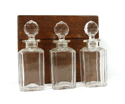 Lot 383 - An early 19th century oak decanter box