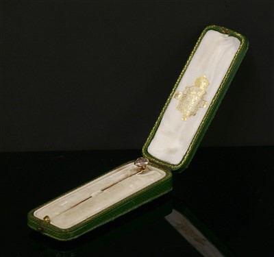 Lot 138 - A single stone diamond stick pin