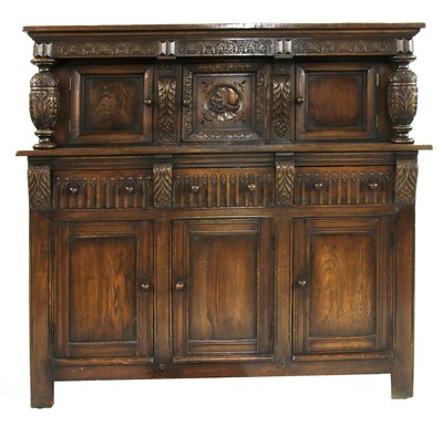 Lot 299 - A carved oak buffet