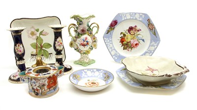 Lot 178 - Botanical ceramics, including a pair of candlesticks