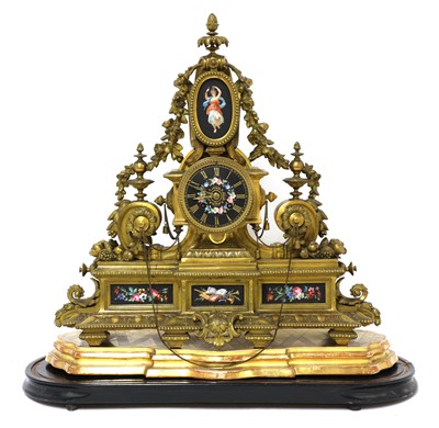 Lot 209 - A French gilt bronze and black porcelain panel mantel clock