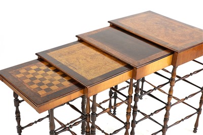 Lot 711 - A nest of four Regency specimenwood and ebonised quartetto tables