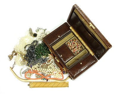 Lot 1073 - A brown snakeskin jewellery box