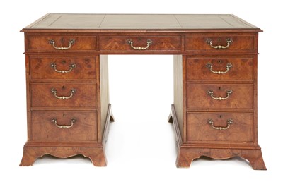 Lot 28 - A burr elm twin pedestal desk