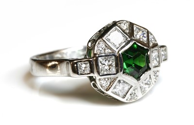 Lot 90 - An 18ct white gold tsavorite garnet and diamond cluster ring