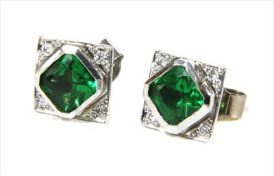Lot 89 - A pair of 18ct white gold tsavorite garnet and diamond square cluster earrings