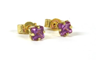 Lot 17 - A pair of 18ct gold single stone sapphire earrings