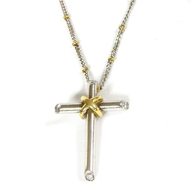 Lot 16 - An 18ct two colour gold diamond set Latin cross