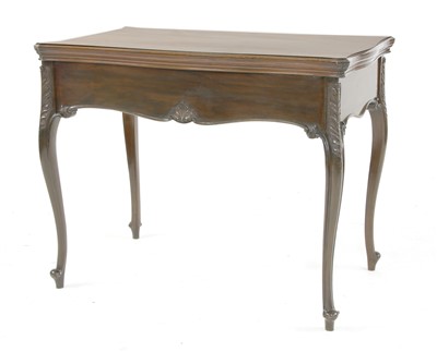 Lot 693 - An Edwardian mahogany metamorphic games table