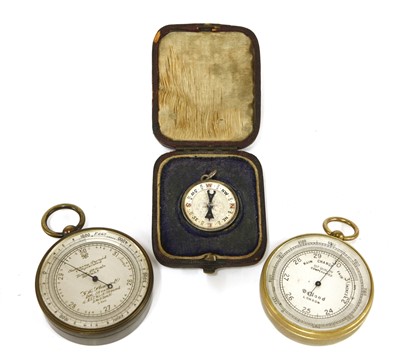 Lot 177 - Three pocket barometers/altimeters and silver fob