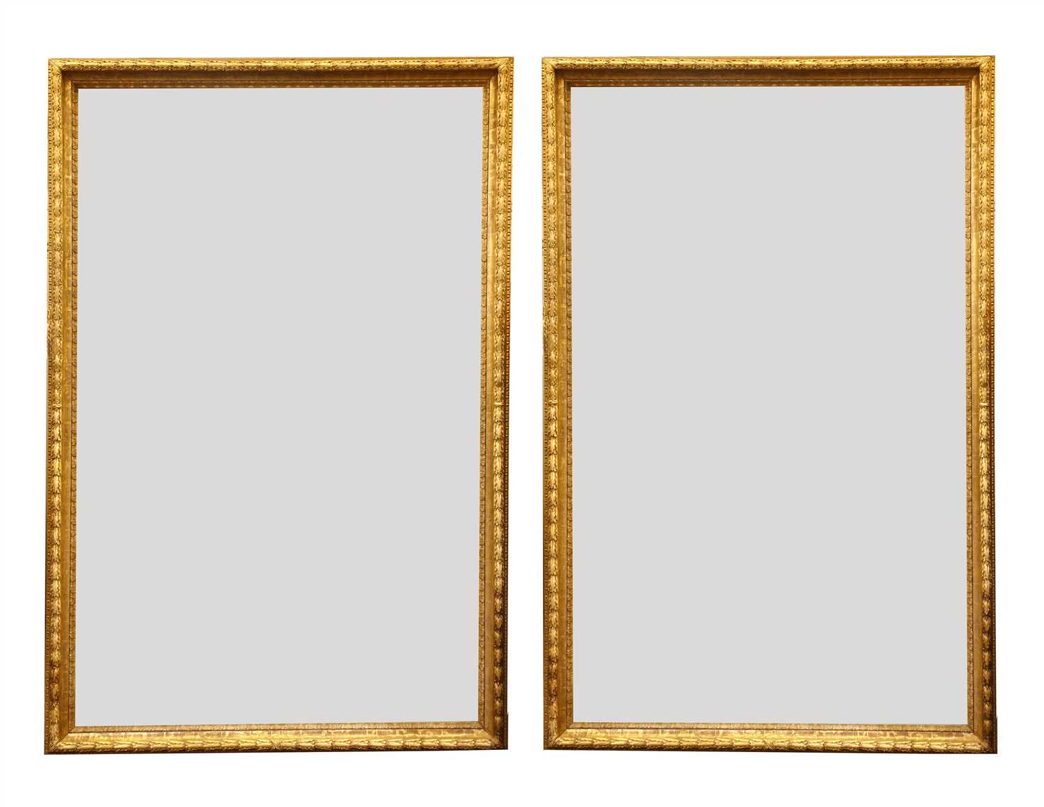 Lot 13 - A large pair of carved and gilded picture frames