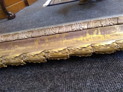 Lot 13 - A large pair of carved and gilded picture frames