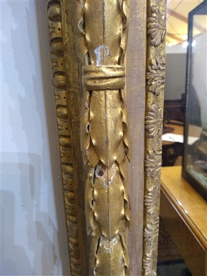 Lot 13 - A large pair of carved and gilded picture frames