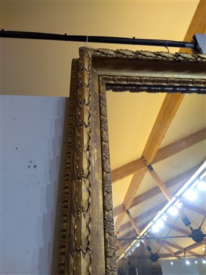 Lot 13 - A large pair of carved and gilded picture frames