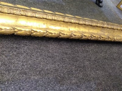 Lot 13 - A large pair of carved and gilded picture frames