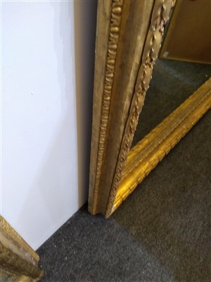 Lot 13 - A large pair of carved and gilded picture frames